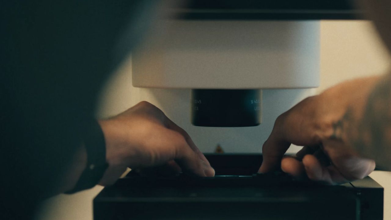 Banner image from Anthropic’s official Model Hardware Standard article, illustrating the concept of AI working alongside laboratory hardware.